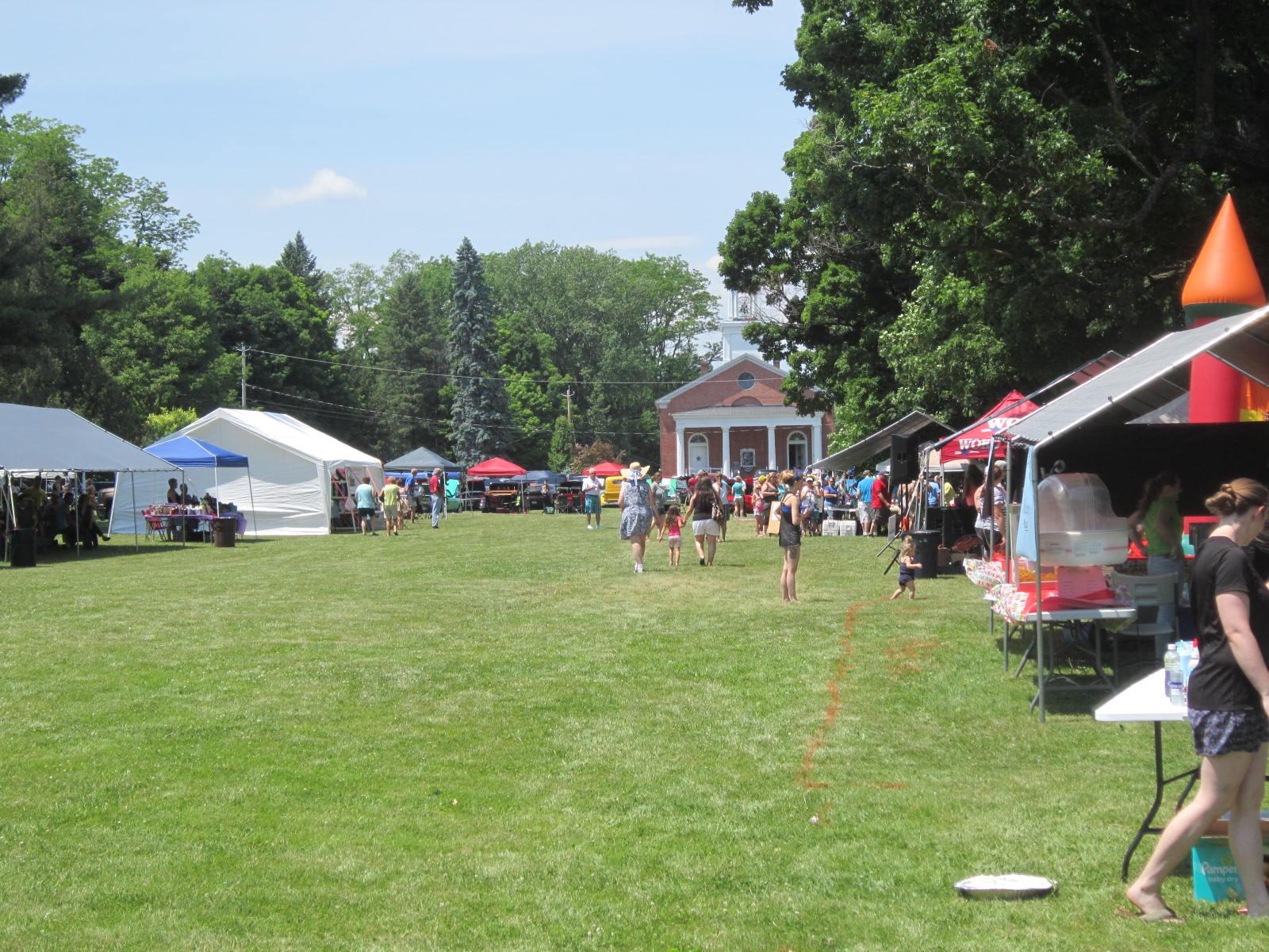 A village green with a festival happening