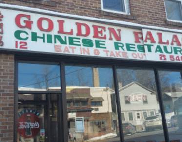 A large white sign above the window reading Golden Palace Chinese Restaurant.