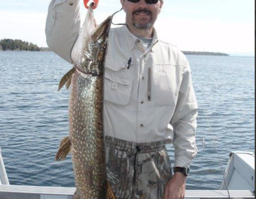 angler holding a large fish