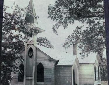 A black and white photo of St Johns Church from yester-year