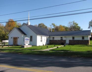 White exterior of the Assembly of God building