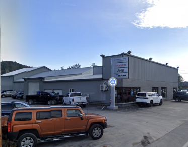 Large exterior of the building of Adirondack Auto Service