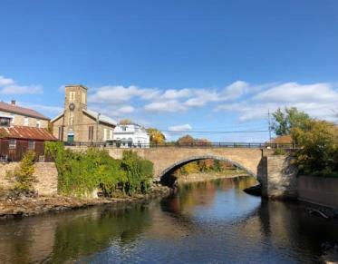 A stone bridge over a river