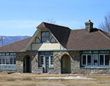 Exterior of the stone building housing the Westport Health Center
