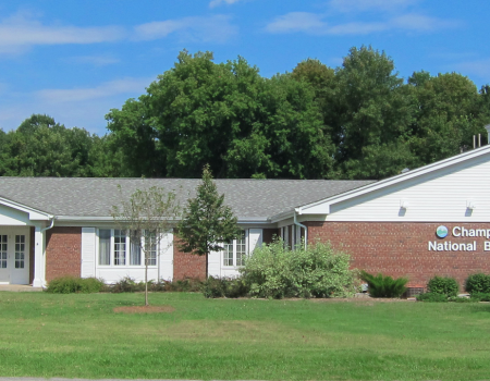 A brick building with white trim.