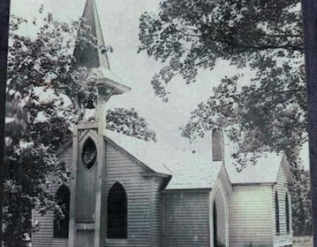 A black and white photo of St Johns Church from yester-year