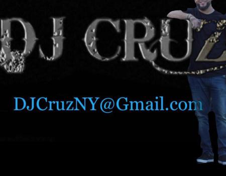 DJ Cruz with the dj himself leaning on the lettering