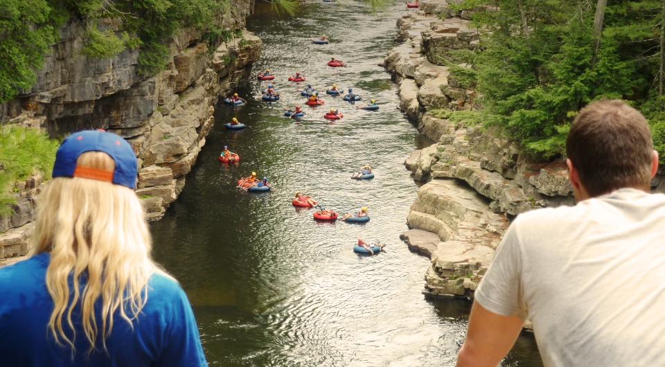 Floating down the river  surrounded by the towering walls of the chasm