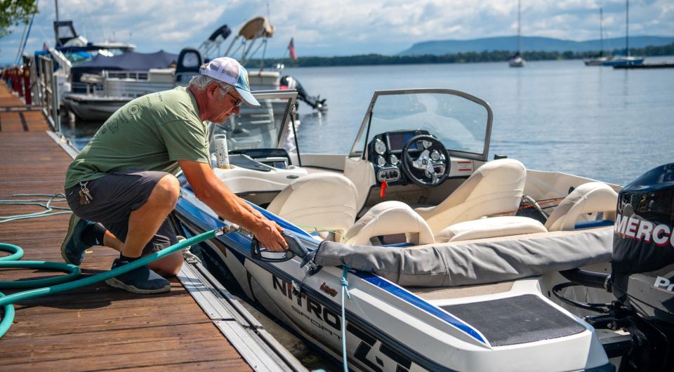 filling up a boat at marina on Lake Champlain