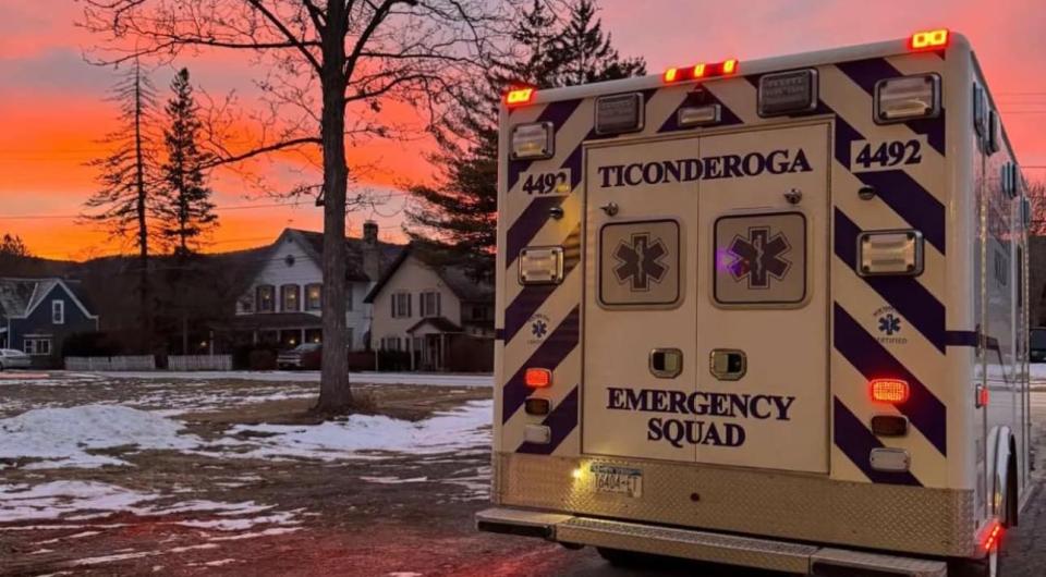 The Ticonderoga Emergency Squad ambulance sits under a sky the colors of cotton candy at sunset.