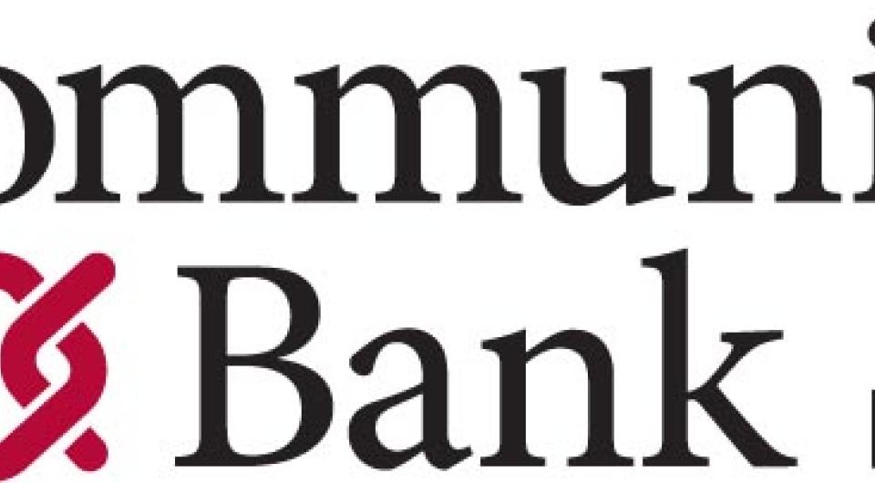 The white banner with black letters of Community Bank logo