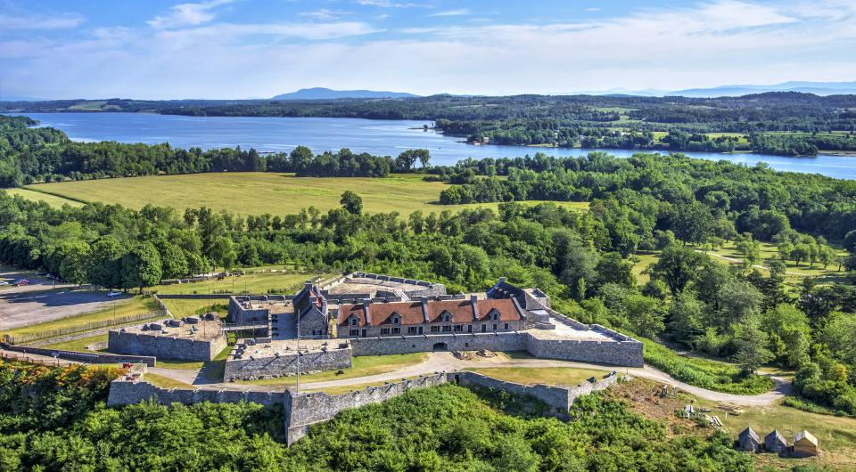 An aerial view of the fort with Lake Champlain in the distance