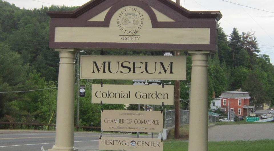 Road sign for the Adirondack History Museum