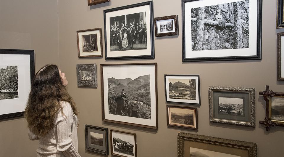 Images with description cards hung on walls.