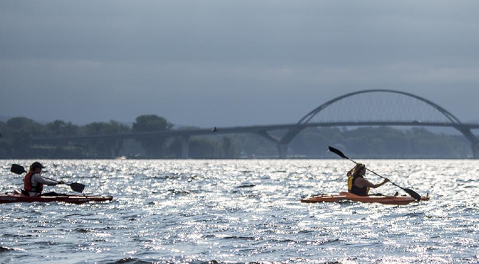 kayakers paddling near Lake Champlain Bridge