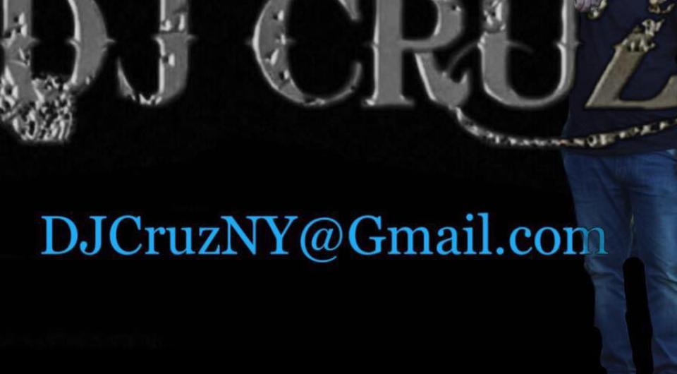 DJ Cruz with the dj himself leaning on the lettering