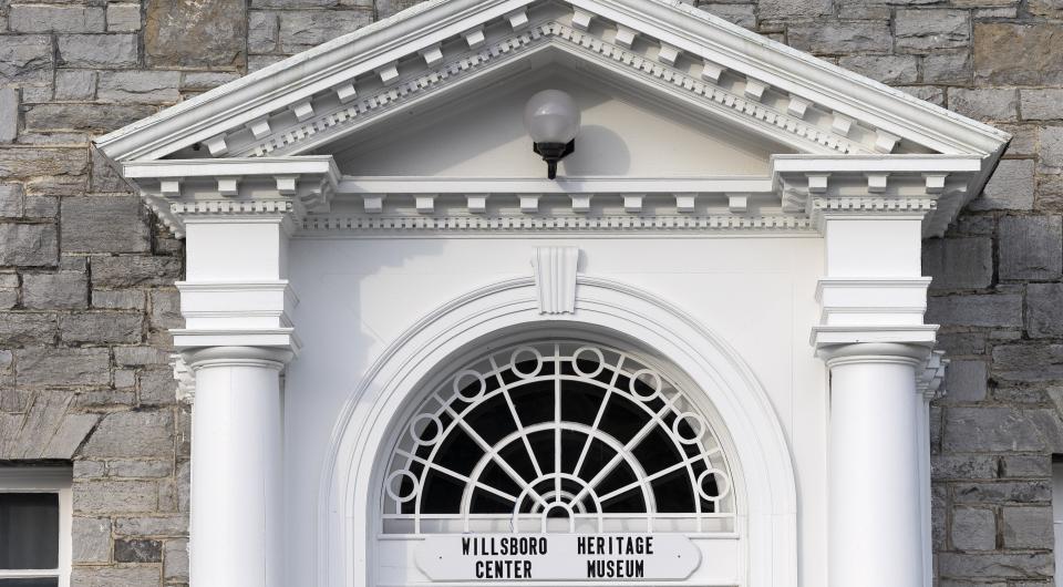 The ornate pillars and glass transom above the entry way to the Willsboro Heritage Center Museum.