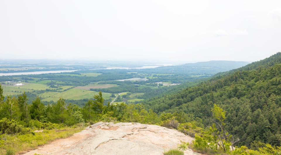 View from a rocky summit over farmland