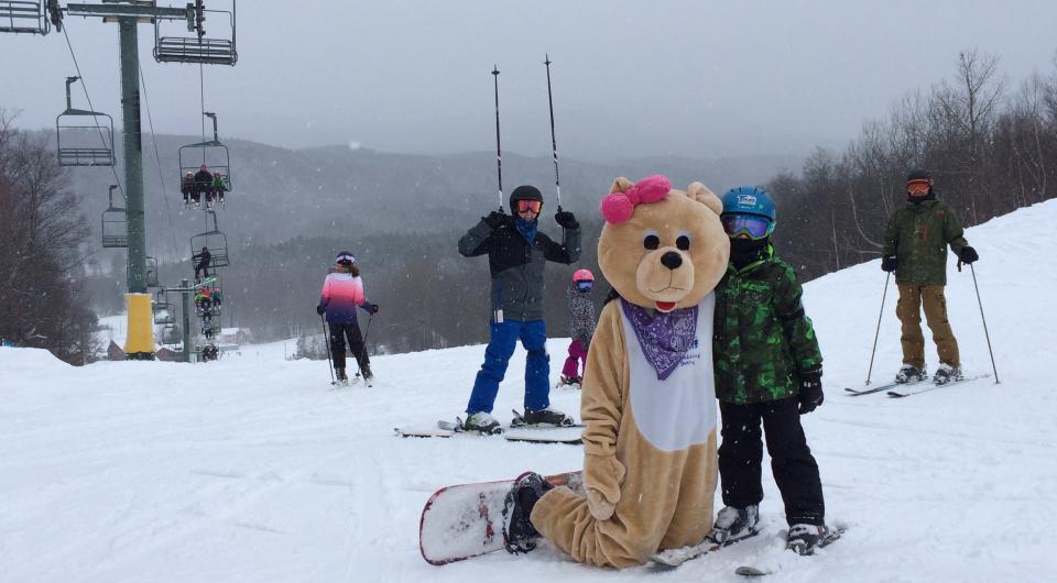 Someone in a teddy bear costume at Titus Mountain
