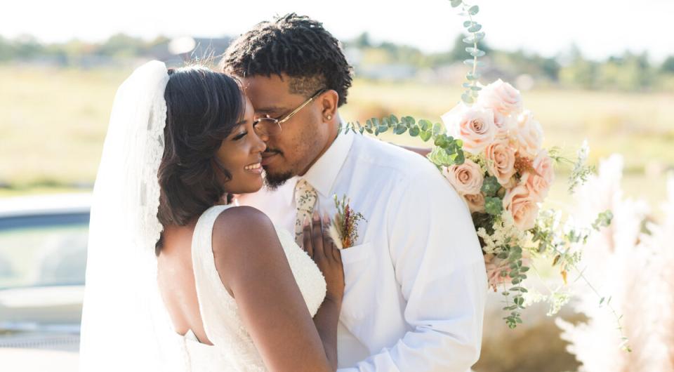 a bride and groom embracing