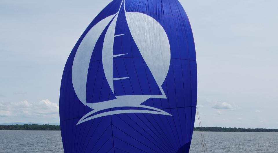 Blue sail on sailboat