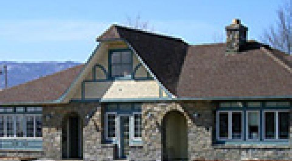 Exterior of the stone building housing the Westport Health Center