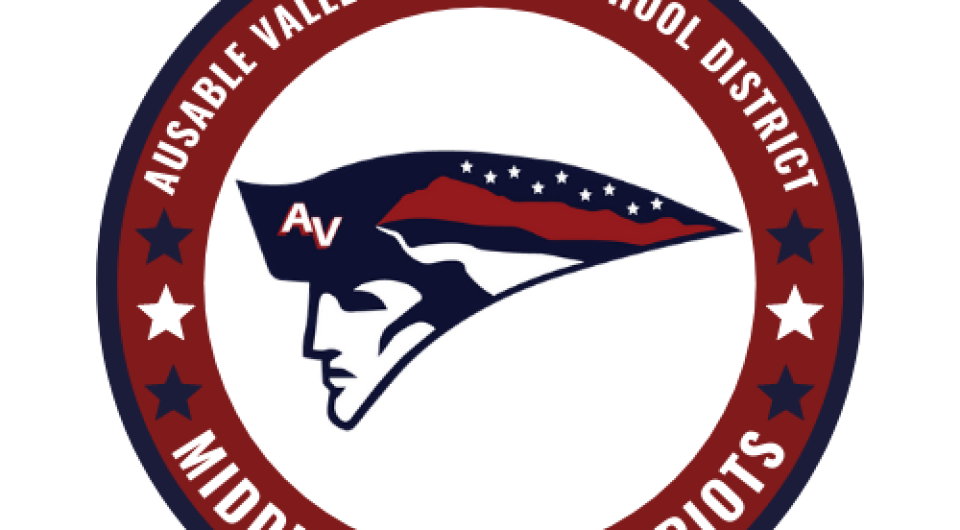 A circular badge with a profile of a man with a colonial hat that is striped red