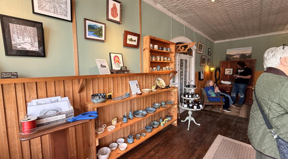  hats and wall decor on display at The Finishing Stone.