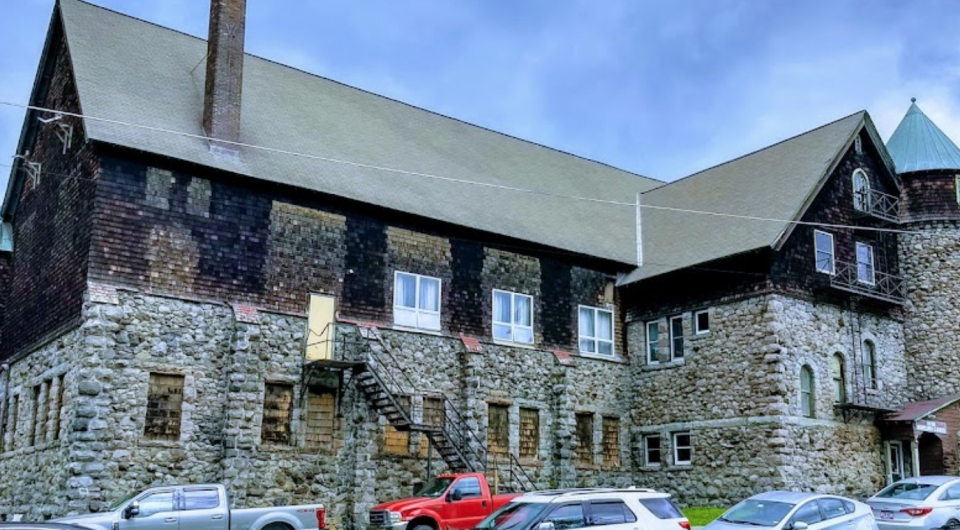 A stacked stone building.