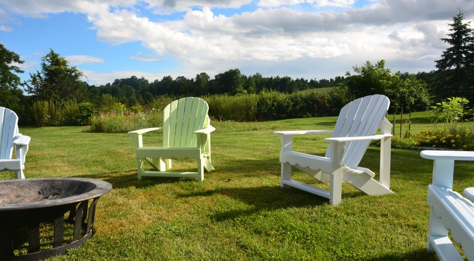 Adirondack chairs in a lawn