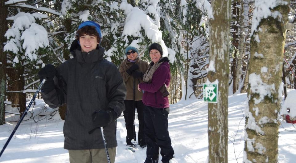 people snowshoeing