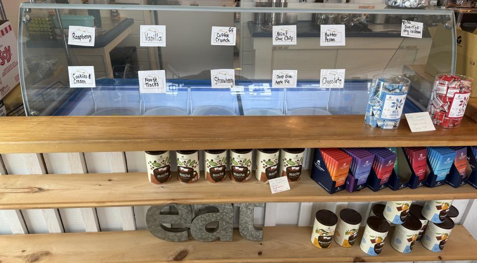 A freezer stocked with meals ready to bring home from Essex Ice Cream Cafe.