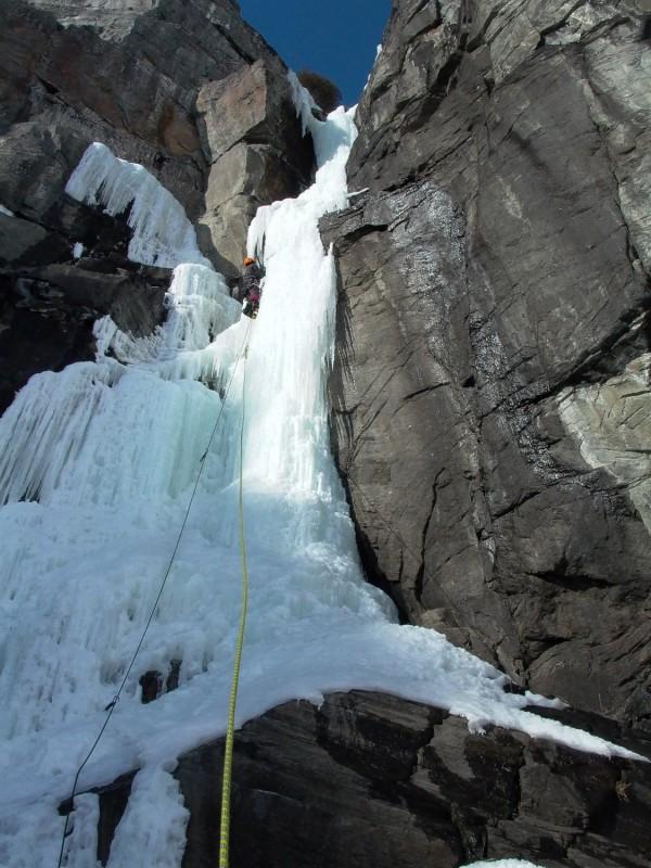 An ice climber tackles the frozen side of the Palisades.