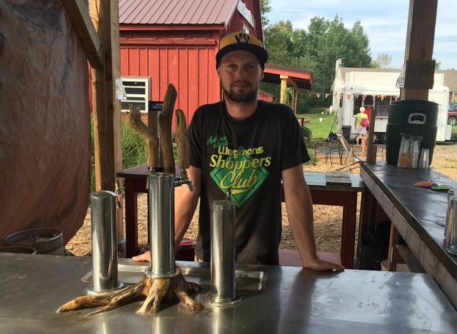 Dan Badger at the Ausable Brewing outdoor bar
