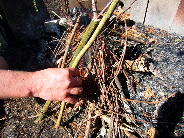Add larger sticks as soon as the twigs catch
