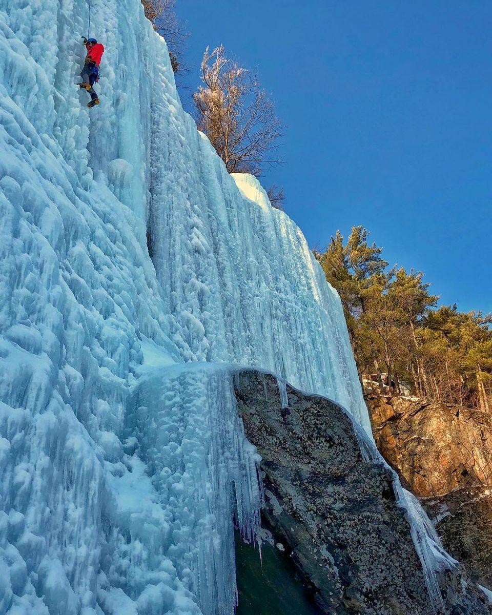 Climbing "The Waterfall" on Poke-O-Moonshine.