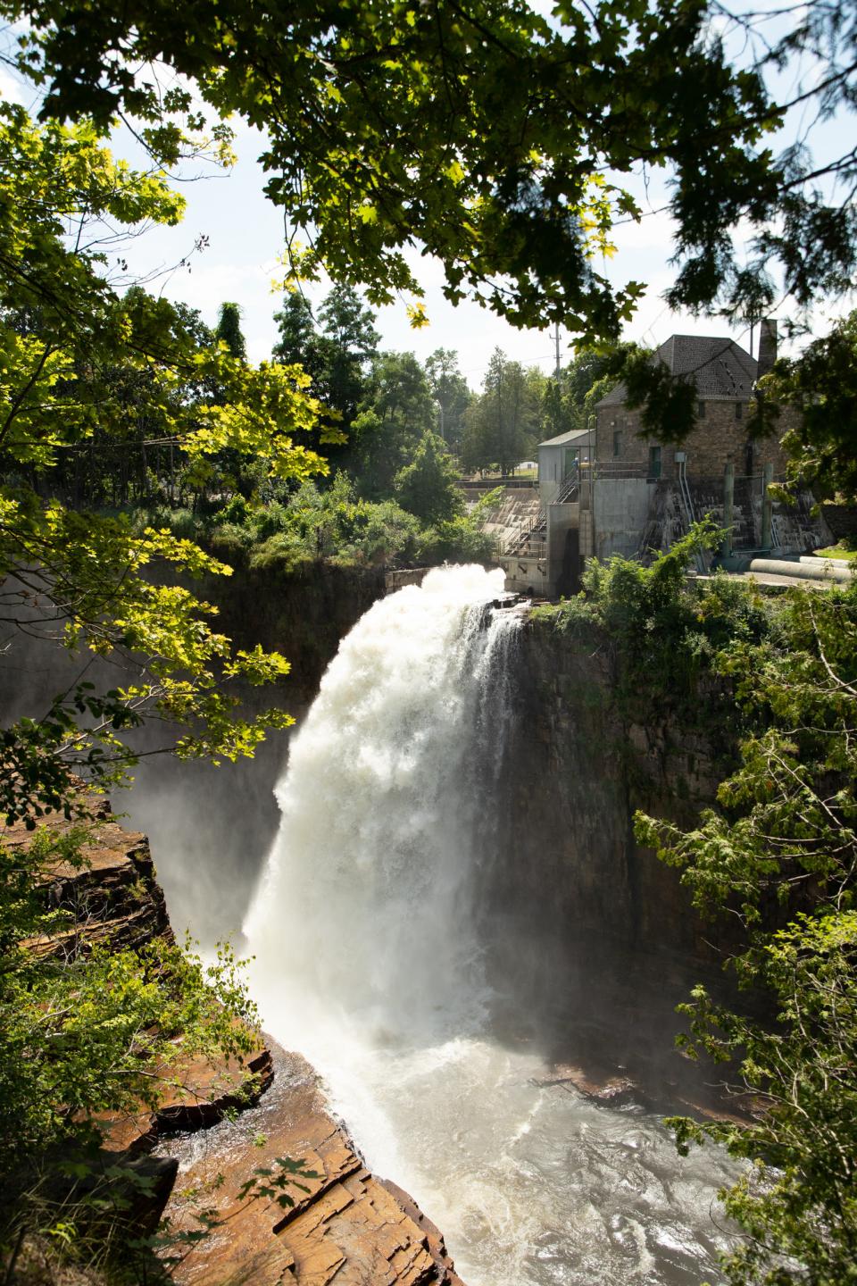 Long view of a tall waterfall at Ausable Chasm.