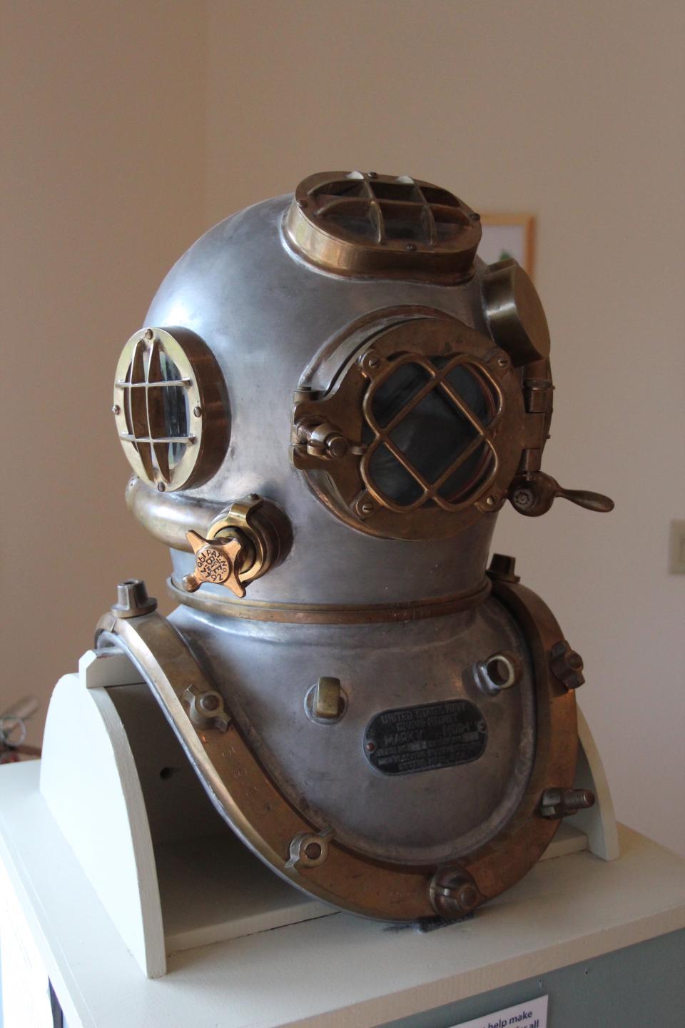 Close up of an antique diving helmet.