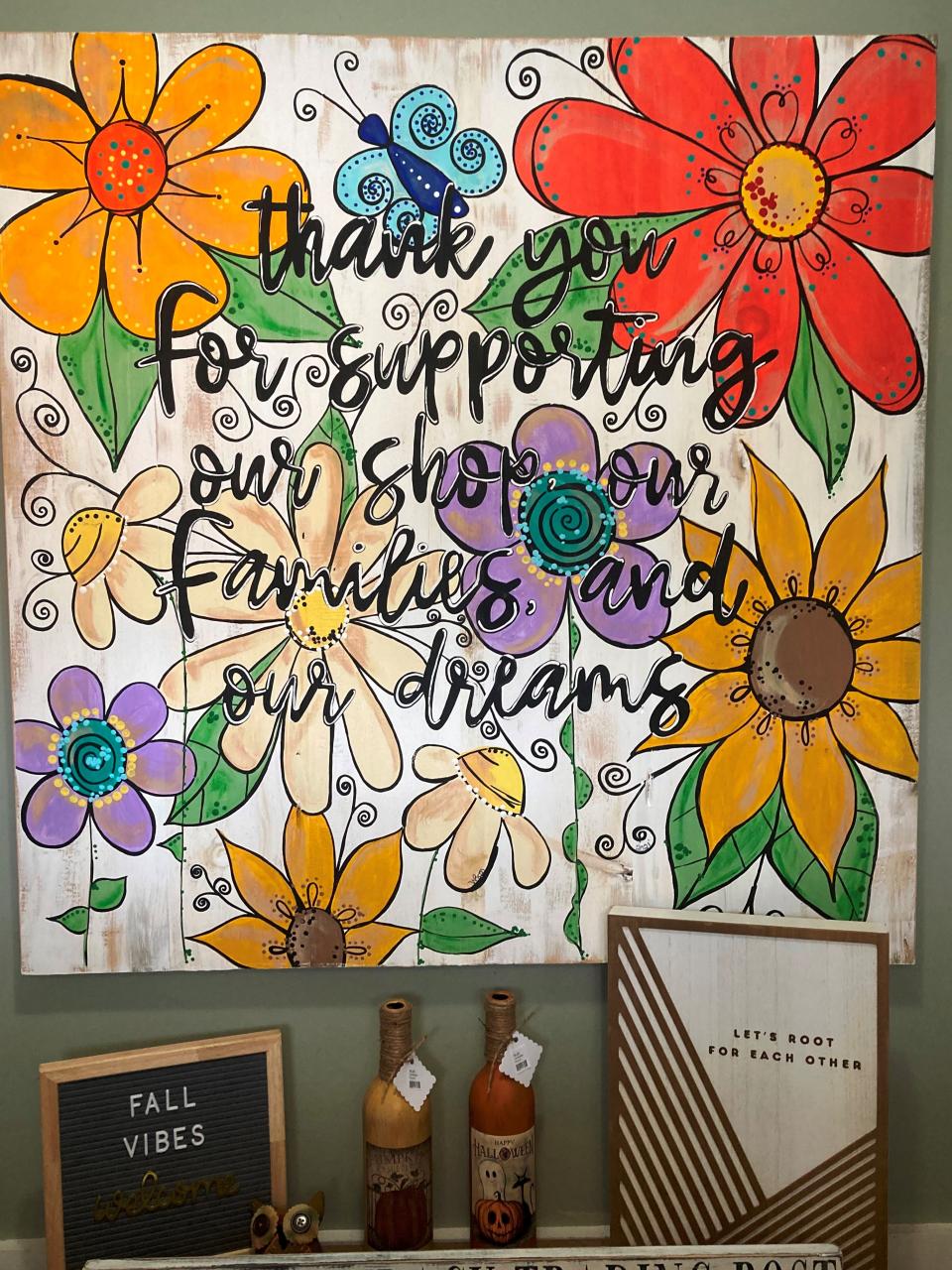 Colorful and heartfelt messaging on signs in the store. Let's root for each other!