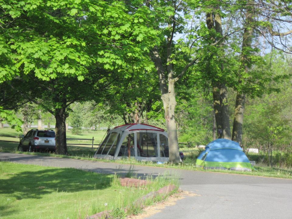 Campers with tents enjoy their summer at Crown Point Campground