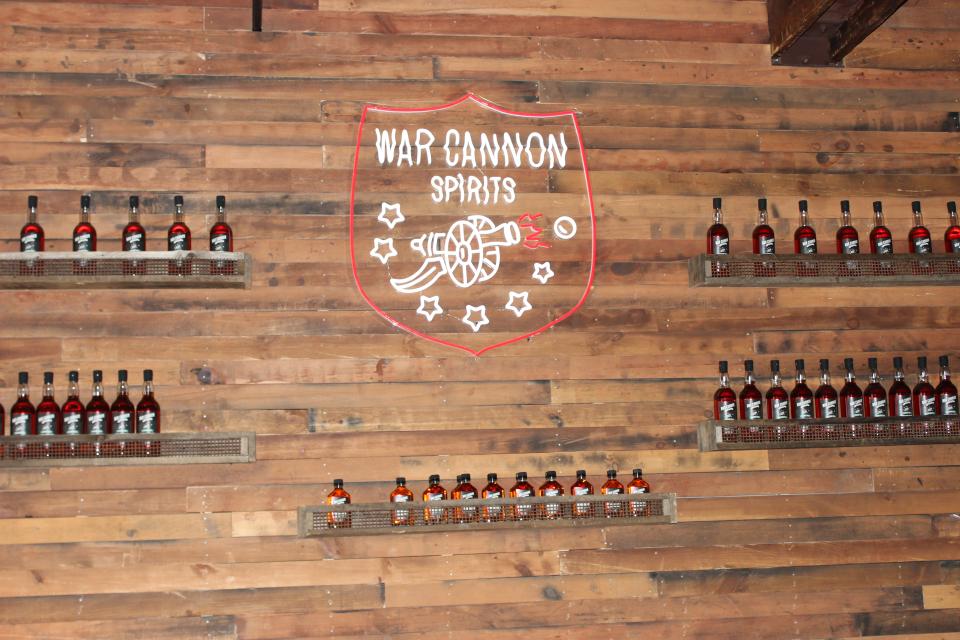 War Cannon Spirits logo and bottles