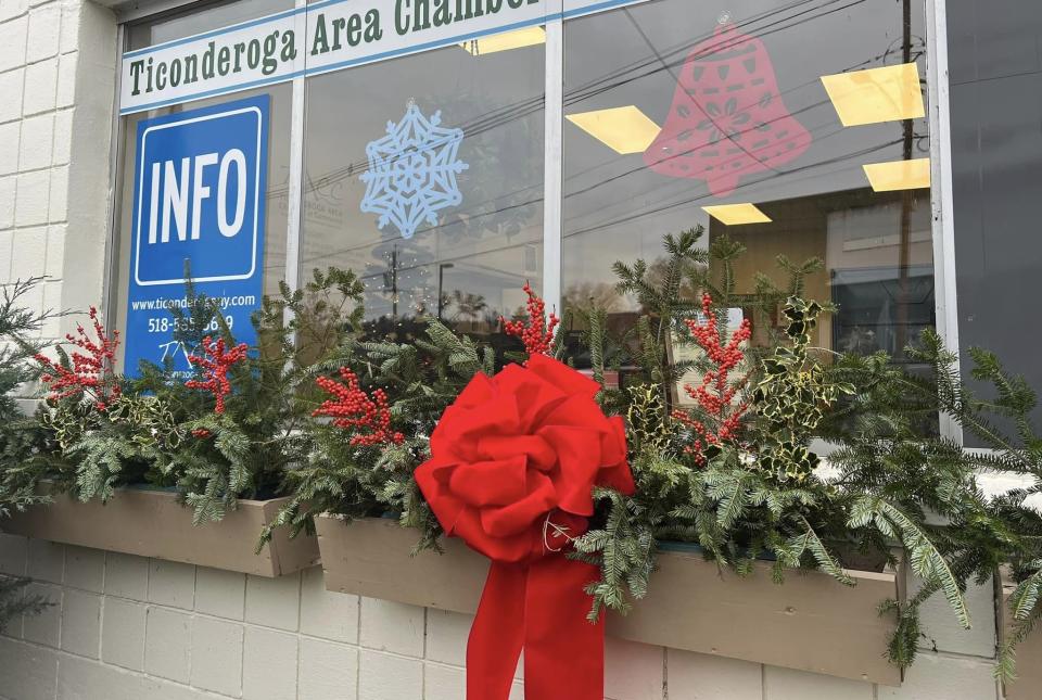 A ribbon adorns a Chamber of Commerce storefront