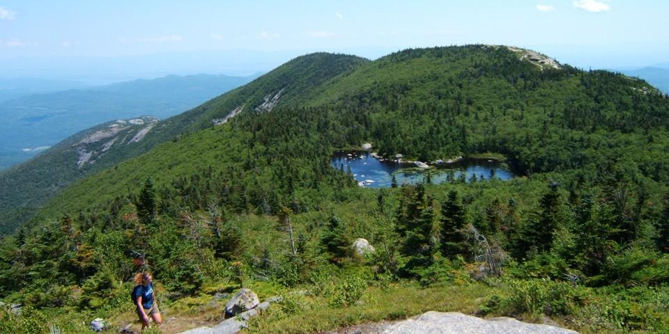 A high elevation lake appears on the way to the summit.