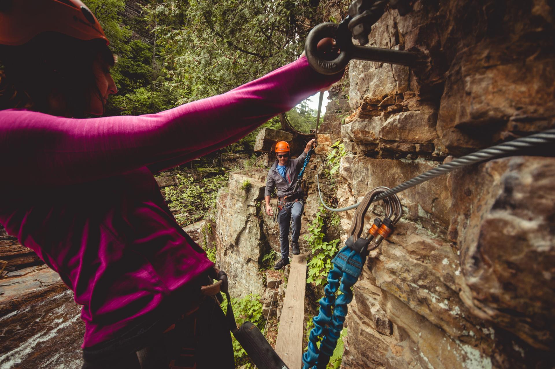 Experience the chasm from above harnessed to cables and walking wooden planks