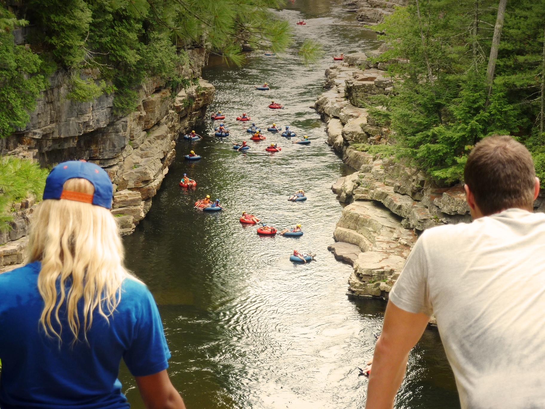 Floating down the river  surrounded by the towering walls of the chasm