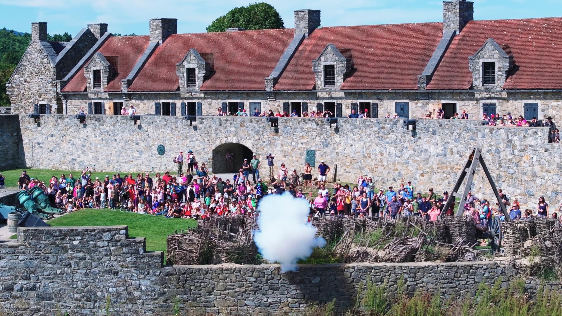 A firing cannon in the evening
