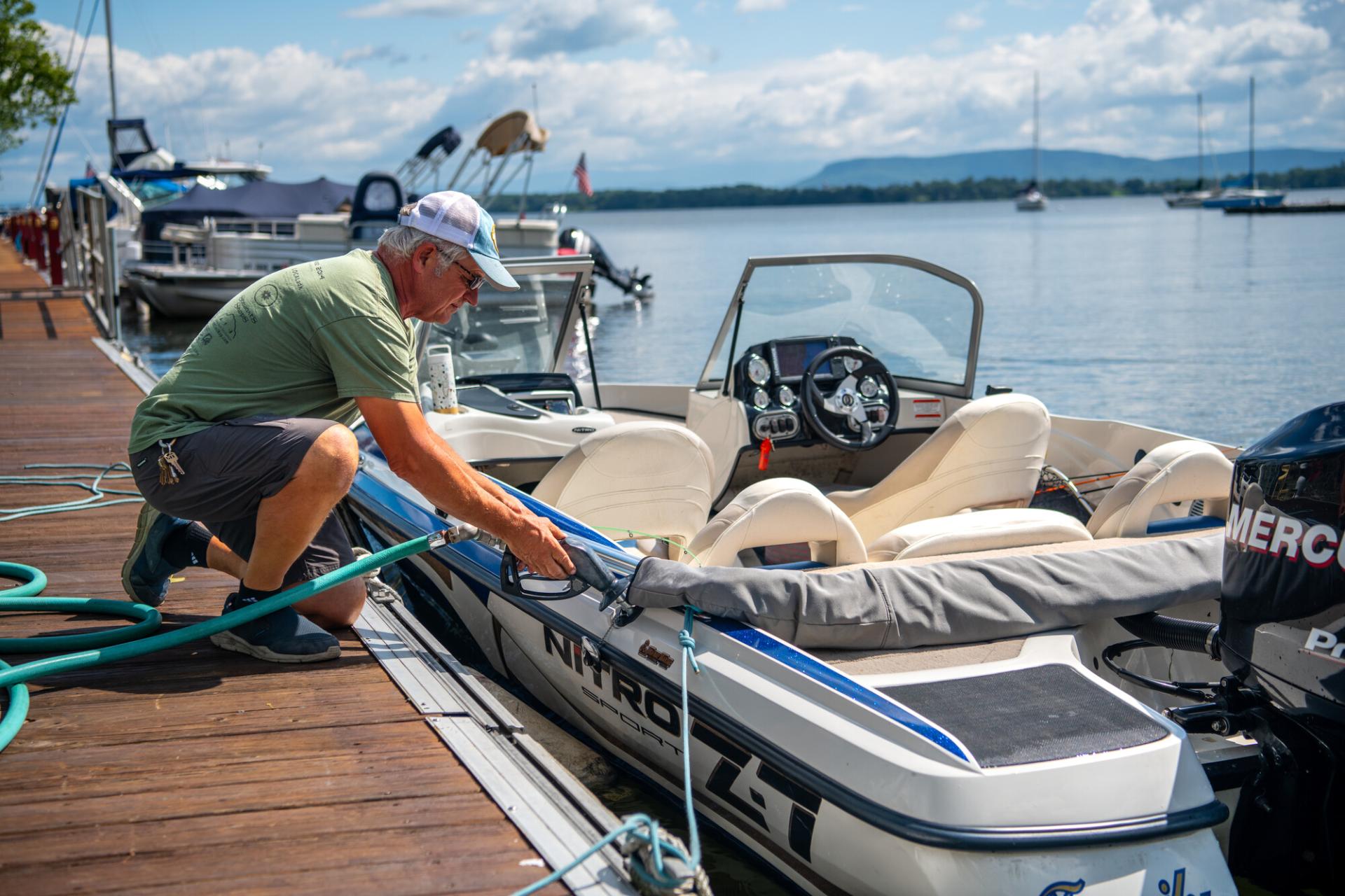 filling up a boat at marina on Lake Champlain
