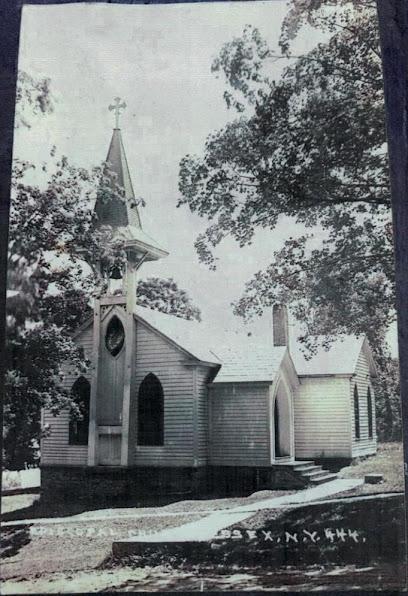 A black and white photo of St Johns Church from yester-year