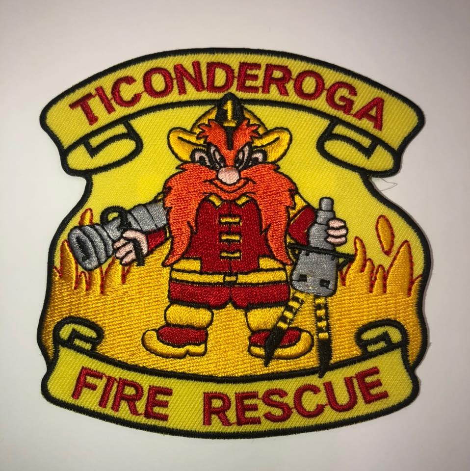 A yellow patch for the Ticonderoga Fire Rescue