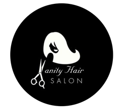 A black circle with a relief of a person with luscious long hair and bangs and Vanity Hair Salon with the V replaced with a pair of sheers
